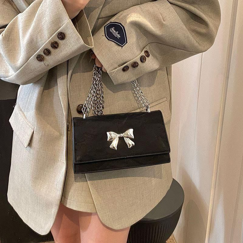 A. Cartera con Lazo 9822 2.0