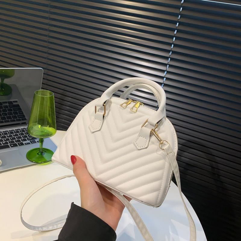 A. Cartera Pqueña, incluye tira larga 11.0