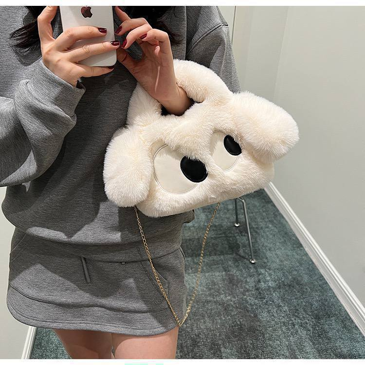 A. cartera de Peluche 14.0