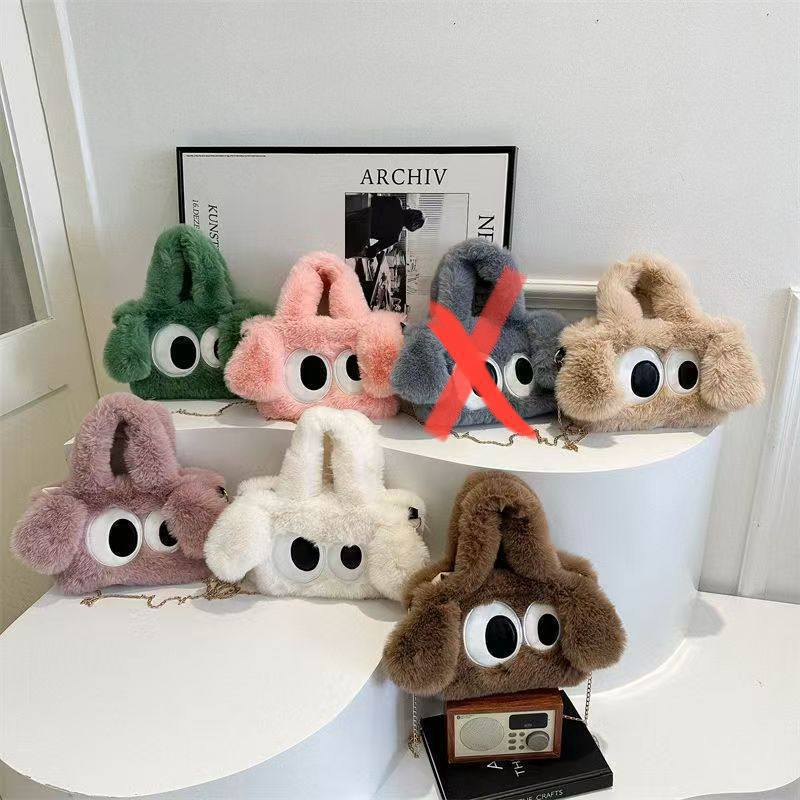 A. cartera de Peluche 14.0
