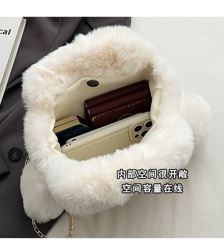 A. cartera de Peluche 14.0