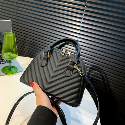 A. Cartera Pqueña, incluye tira larga 11.0