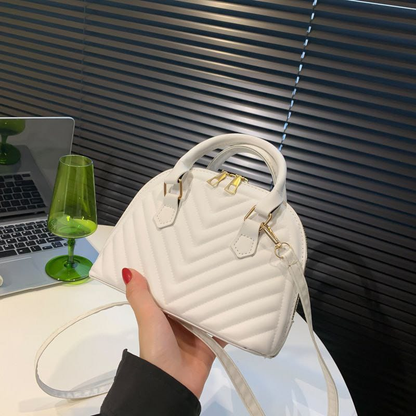 A. Cartera Pqueña, incluye tira larga 11.0