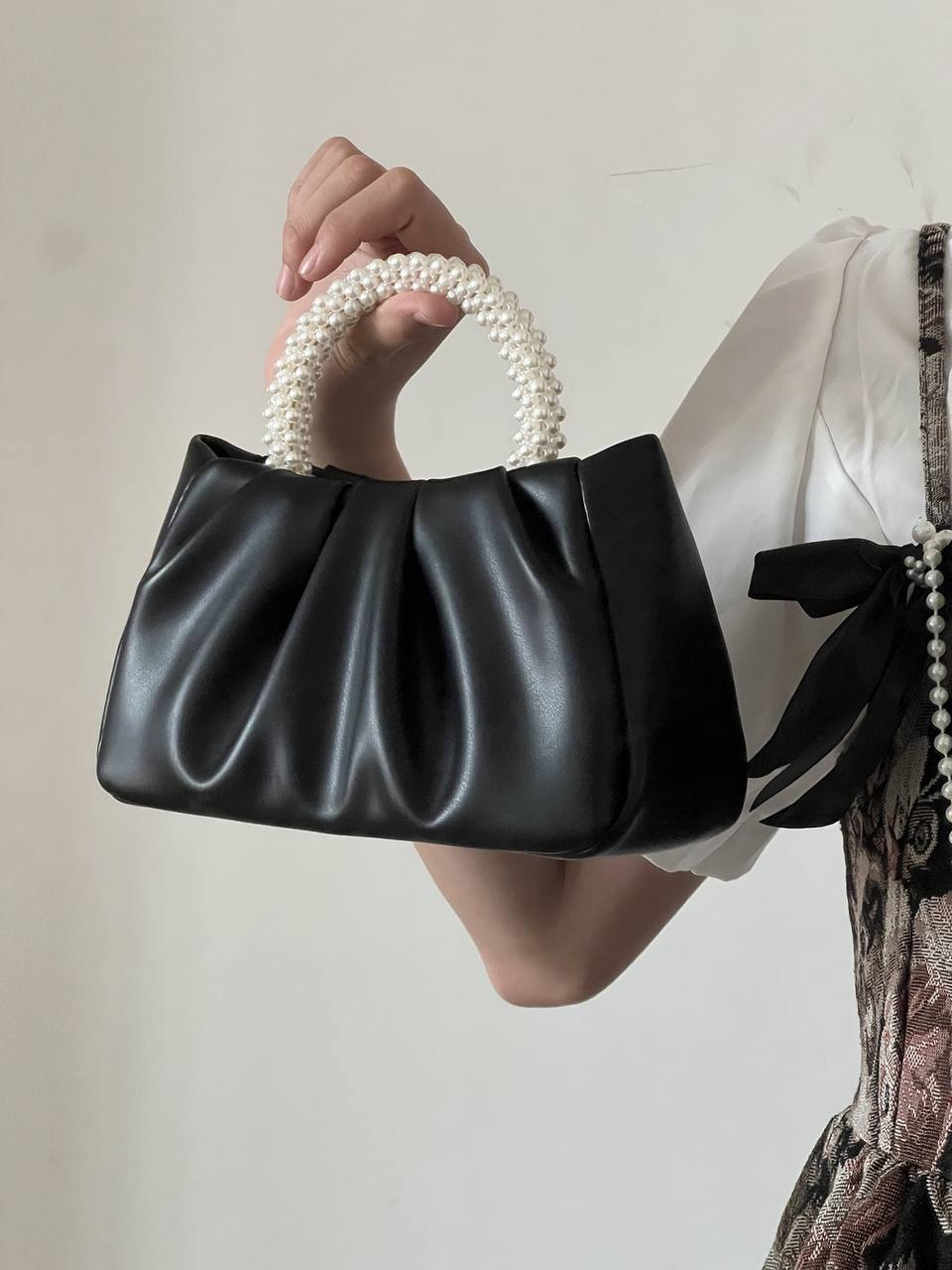 A. Cartera elegante pequeña 14.0