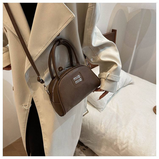 A. Cartera casual pequeña 14.0