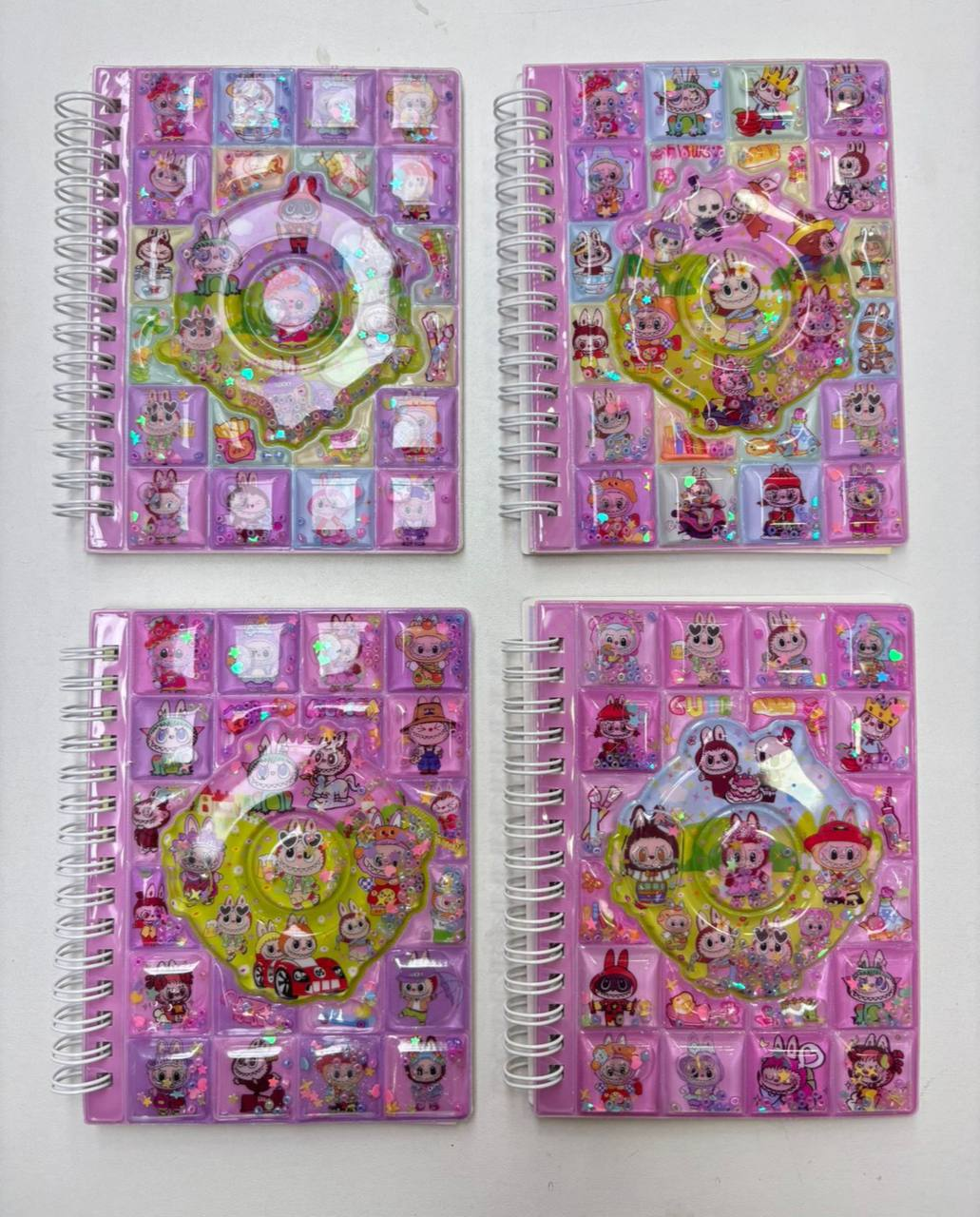 Cuaderno pasta de agua con  Stikers Grandecitos  8.0